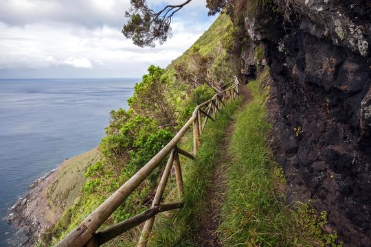 Hiking trail on the south coast near Faja de Lopo Vaz, island of Flores, Azores, Portugal, Europe