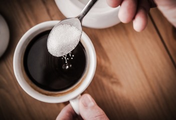 Adding Sugar to Coffee - obrazy, fototapety, plakaty