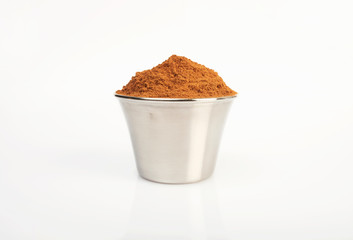 cinnamon powder isolated on a white background