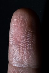 Fototapeta premium an image of human finger close up