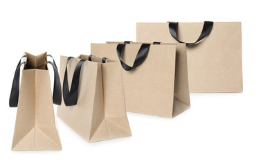 Set of paper bags for shopping on white background. Mockup for design