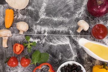 Ingredients for cooking pizza on stone table, top view