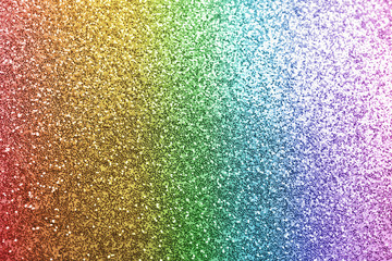 Composition of sparkling rainbow glitter as background, top view © New Africa