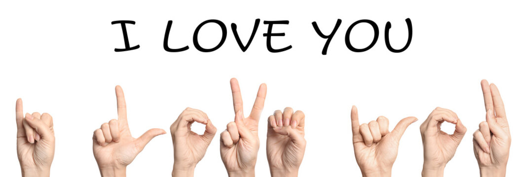Woman showing phrase I LOVE YOU on white background. Sign language