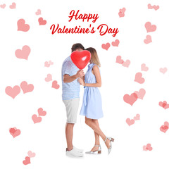 Young couple hiding behind heart-shaped air balloon on white background. Celebration of Saint Valentine's Day