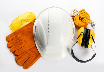 Set of safety equipment on white background, top view