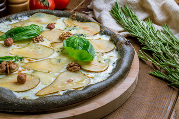 Pizza with pears and Gorgonzola cheese.