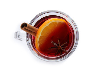 Glass cup of mulled wine isolated on white, top view