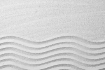 Foto op Canvas Zen-tuinpatroon op zand als achtergrond, bovenaanzicht met ruimte voor tekst. Meditatie en harmonie © New Africa