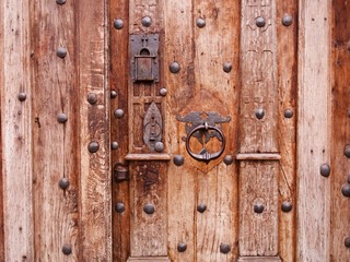 Wooden Brown Door with Iron Locks and Handle