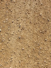 Gritty, sandy and damp nature. Walkway after raining. View from above