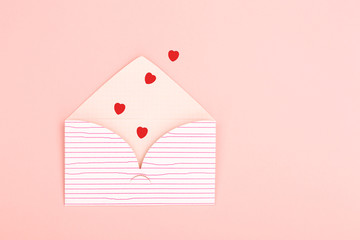 Envelope on pink background
