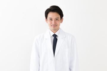 portrait of young asian doctor isolated on white background