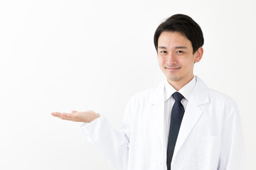 portrait of young asian doctor isolated on white background
