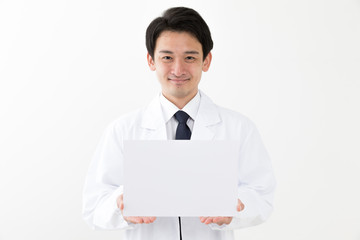 portrait of young asian doctor isolated on white background