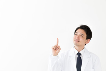 portrait of young asian doctor isolated on white background