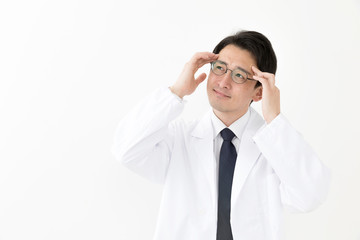 portrait of young asian doctor isolated on white background