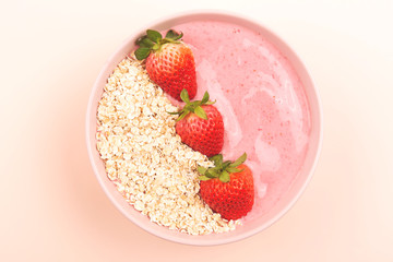 Smoothie bowl on yellow background