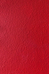 a red rocky and rough texture wall