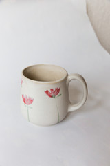 a cup with pattern on white background background