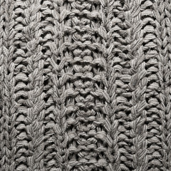 The texture of the knitted gray fabric for the background  