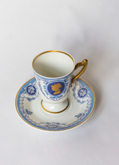 a white tea set with pattern on white background