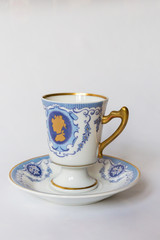 a white tea set with pattern on white background