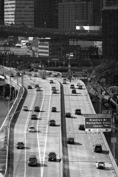 Black & white image of traffic on FDR Drive, from the Manhattan Bridge in New York City