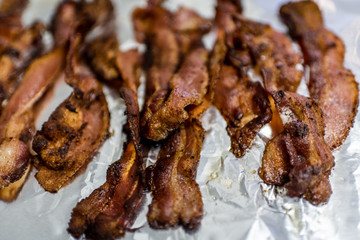 Cooked bacon on foil