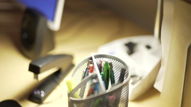Close Up of Desk with Manilla File Folders and Stapler