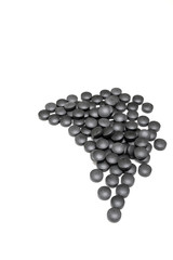 Round black pills of iron on a white background. SUPPLEMENT