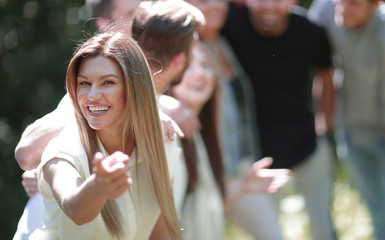 modern girl pointing at you.