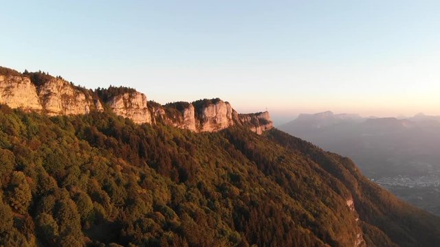 Aerial View of a Mountain with a Giant Christian Cross in the Alpes in France