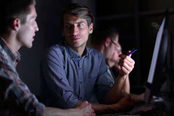 close up.employees of the company are discussing new information
