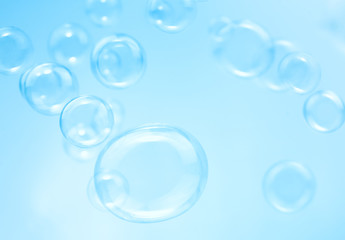beautiful blue soap bubbles float background.