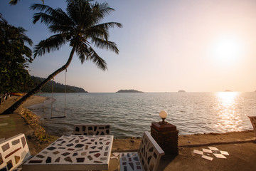 Tropical embankment during amazing sunset.