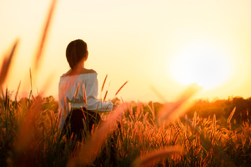 Beautiful Young Woman in a field.
