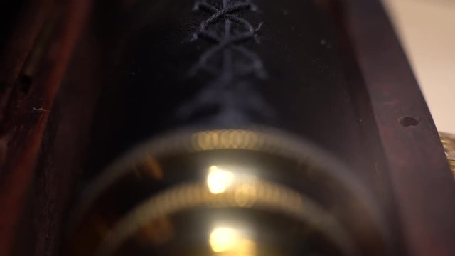 close shot of a monocular in a wooden box macro