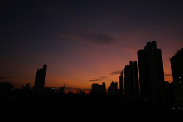  sunset, city, skyline, sky, silhouette, cityscape, sunrise, building, dusk, sun, downtown, architecture, urban, skyscraper, buildings, clouds, night, tower, dawn, thailand, panorama, morning, orange,
