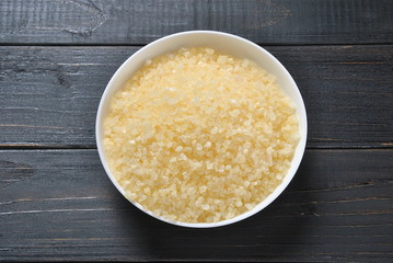 Spa and body care products. Colorful aromatic bath Dead Sea salt. Natural ingredients for homemade body salt scrub. Dead Sea cosmetics. Beauty skin care. Spa treatment.