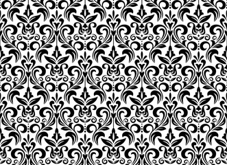 Wallpaper in the style of Baroque. Seamless vector background. White and black floral ornament. Graphic pattern for fabric, wallpaper, packaging. Ornate Damask flower ornament