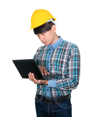 Engineer while holding using Laptop and head wear yellow safety helmet plastic . Concept Work construction on white background
