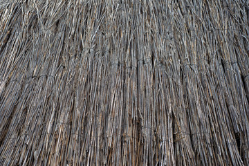 a surface of neatly laid flat straw