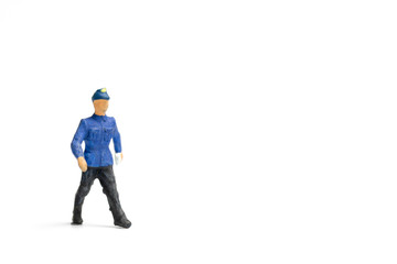 Miniature people : Train staff  isolated on white background