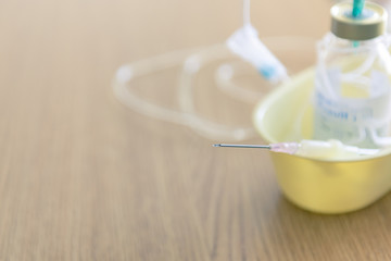 Syringe and brine, Saline solution for patient in hospital, Intravenous medication.