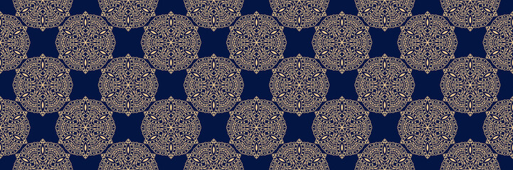 Indian seamless pattern. Golden design on long dark blue background