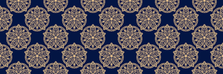 Indian seamless pattern. Golden design on long dark blue background