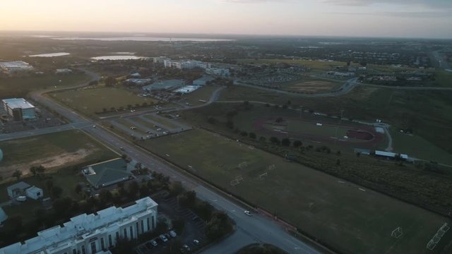 Cinematic drone view of National Training Center and Highway 50 in Clermont, FL.