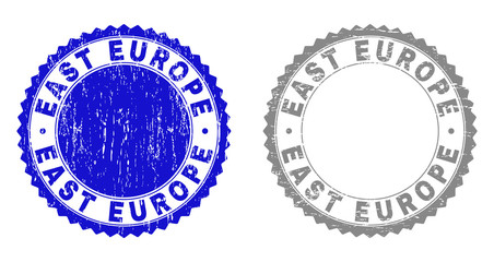 Grunge EAST EUROPE stamp seals isolated on a white background. Rosette seals with distress texture in blue and gray colors. Vector rubber stamp imitation of EAST EUROPE text inside round rosette.