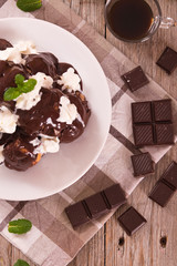 Chocolate profiteroles. 